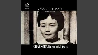 オレンジ色の女