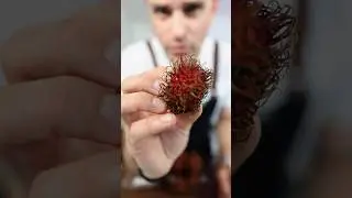 Trying this food. No idea what it is. (Rambutan)