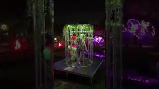 Costumed cage dancers at The Surreal Garden