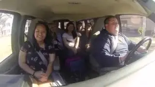 Study abroad alums, in a van