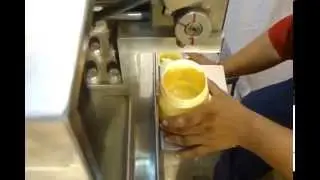 Semi Automatic Cream Filling Machine.wmv
