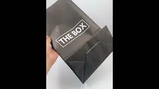 Black letter paper bag with THE BOX logo printed.#leabonpack #paperbags #custom