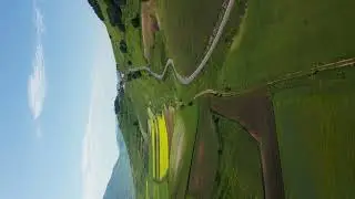 Spectacular vertical aerial drone shot of norcia rural landscape with winding roads FREE STOCK VIDEO