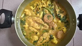 ডালের বরি ফুলকপি দিয়ে তেলাপিয়া মাছের তরকারি। 