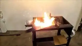 Wood-Fired Forge for blacksmithing with raw wood