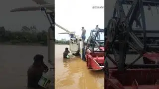 GAM Harvester Washing In River - Harvester Machine Washing Video