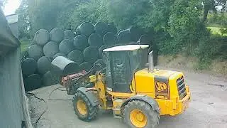 Jcb 412s Putting In Bales From A Keltic