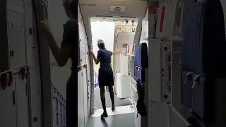 Air hostess opens the gate amazingly .#shortvideo