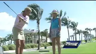 Sandra gets a golf lesson from LPGA instructor