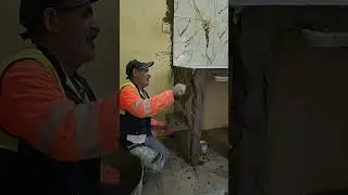 The correct way to level the side of a kitchen table with cement and sand