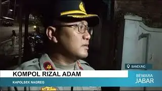 TRUK BERMUATAN AIR MINERAL TERGULING DI TURUNAN NAGREG