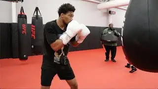CHARLES HARRIS JR LOOSENING UP ON THE AQUA BAG AT THE UFC TRAINING FACILITY IN LAS VEGAS