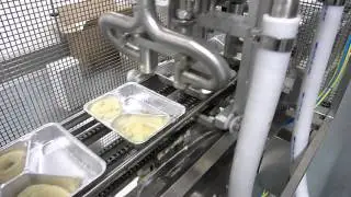Doseren van aardapelpuree / depositor for mashed potatoes with garniture