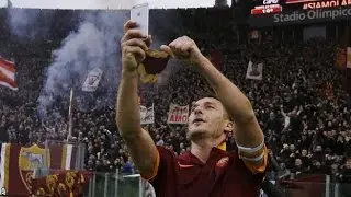Francesco Totti scores and celebrates with a selfie
