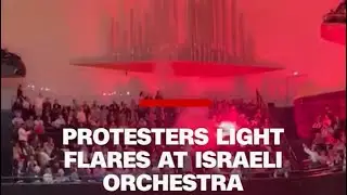 🇫🇷 Chaos erupted inside a Paris music hall as pro-Palestinian protesters lit red flares during 