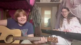 Happy Birthday to Louise Sung by Fiona (on guitar) and Mia (on keyboard)