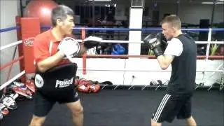 Liam body shot and Miles counter hook with step back.