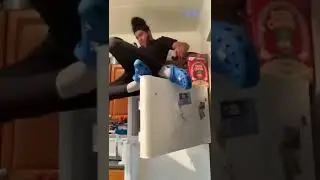 Guy Accidentally Falls Off Refrigerator While Trying to Make Poses on Top of it - 1299694