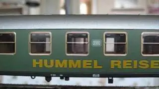 HO Roco V200 035 und V200 040 Touropa und Hummel Ferienzuege epoche3 (a)