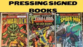 Cleaning and pressing 5 signed comic books