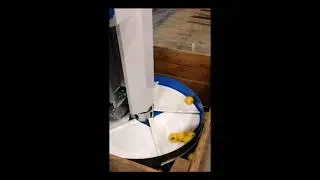 Rotary bin filler for fruit