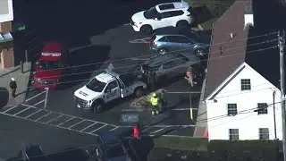 Multi-car crash in North Shore parking lot leaves two trapped