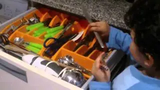 5 year old kid setting the dinner table
