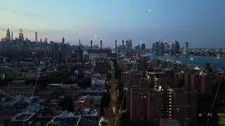 Evening Aerial View of Manhattan, Featuring Iconic Skyscrapers and the Hudson River