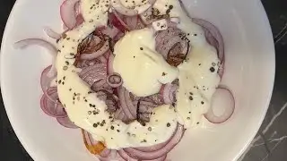Yogurt and Onion Rings Salad Garnished with Cracked Pepper, Salt and Lemon Juice