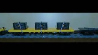 LEGO / BlueBrixx - Norfolk Southern EMD GP40-2 moving some retired battery boxes to the scrapyard