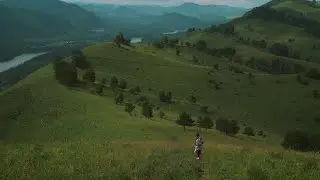 Walking Through Grassy Mountains Stock Video