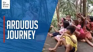 Volunteer teachers, Indigenous children cross rivers, walk trails to go to school
