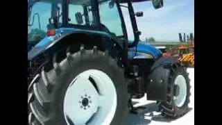 TRATTORE GOMMATO NEW HOLLAND TM 125 .AVI