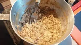 Soft bananas, 2 eggs, bran flakes, a little cheese and soy sauce!