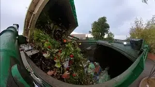 Waste Management garbage truck dumping organic waste