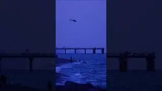 Helicopter joins the search and rescue mission near the Haulover Inlet beach after dark