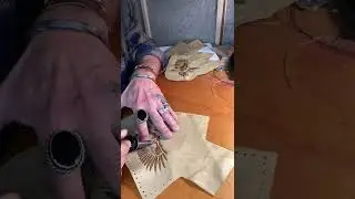 Hand burning my custom Eagle design into a pair of moccasins. #faemoonwolfdesigns