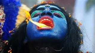 Photos of the Day - Artist Eats Fire In India - April 8, 2014