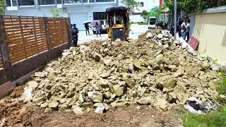 KOMATSU Bulldozer Pushing The Rocks Filling up the areas