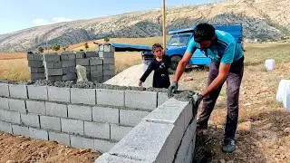 Building Walls, Building Dreams: Atabek and Afsaneh's Collaborative Effort