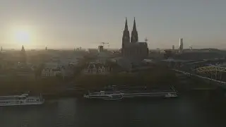 River, city and sunset l Aerial (5,7K)