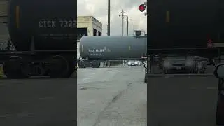 Tank Car Train at Railroad Crossing