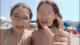 Beach girls doing Gymnastics