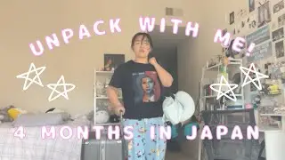 UNPACKING MY SUITECASE AFTER 4 MONTHS IN JAPAN + KOREA!! concert merch, japanese snacks, sanrio etc!
