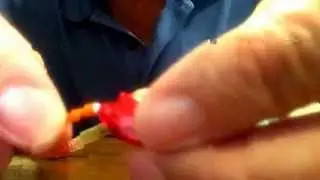 Maggie Rutkowski - Cleaning her hearing aid with a Jodi-Vac
