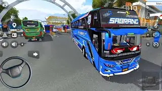 BUS SABRANG SAMBIRU FULL STROBO KELUAR DARI PINTU GERBANG PELABUHAN