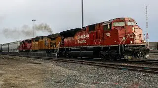SD70ACu leader w/Shiny Union Pacific!! CP 7025, UP 7183 and CP 2268 lead CP C58 into CP's Alyth Yard