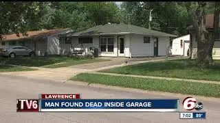 Man found dead in garage in Lawrence