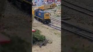 The CSX maintenance of way train decends down the hill #model #csx #MoW #train #fun #dcc #texas #toy