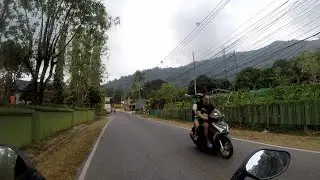 Scooter ride through beautiful  Koh Chang, Thailand